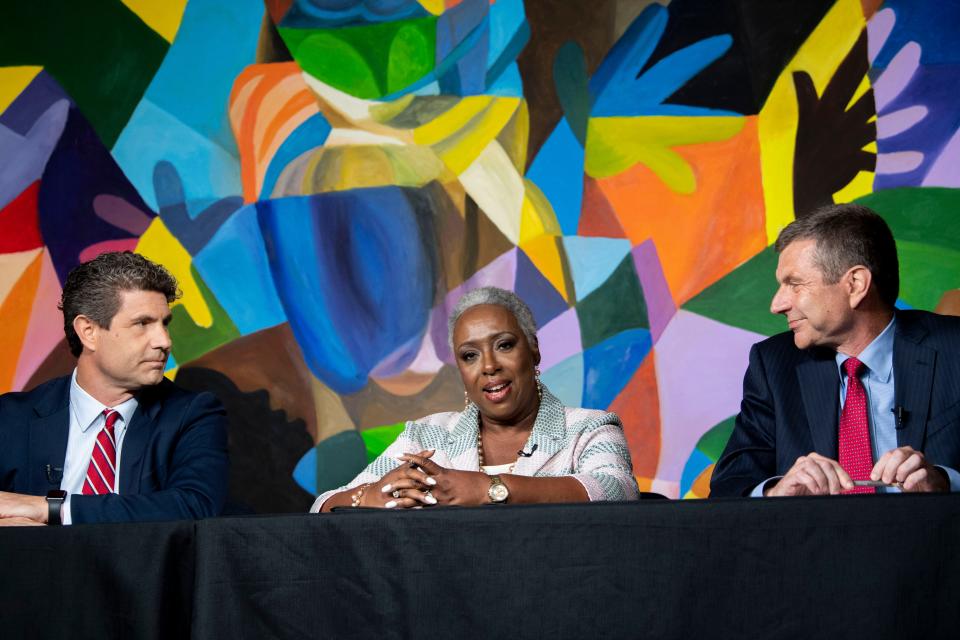 Mayoral candidate Sharon Hurt, center, during the third Nashville Mayoral Debate at American Baptist College in Nashville , Tenn., Thursday, July 6, 2023. She is flanked by candidates Matt Wiltshire, left, and Jim Gingrich, right.