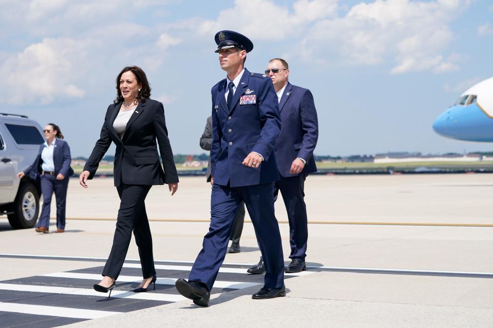 United States Air Force Lt. Col. Neil Senkowski escorts Vice President Kamala Harris after she deplaned Air Force Two when a technical issue forced the aircraft to return and land at Andrews Air Force Base, Md., on June 6, 2021, as she was en route to Guatemala City.