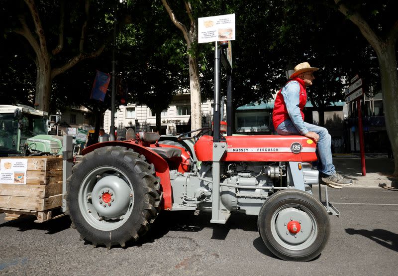 FILE PHOTO: Spanish farmers in Catalonia stage a tractor go-slow protest against the effect of drought in Lleida