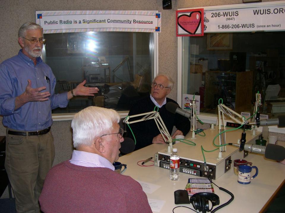 Longtime WUIS-FM news director Richard Bradley (standing) prepares to tape Abraham Lincoln scholar Phillip S. Paludan and Cullom Davis, former head of the Lincoln Legal Papers. Bradley died Monday.