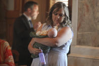 Kansas state Rep. Tori Marie Blew, R-Great Bend, holds her 5-week-old daughter, Brynn, during a debate in the House on a bill aimed at luring the Kansas City Chiefs to the state helping the Super Bowl champions pay for a new stadium, Tuesday, June 18, 2024, at the Statehouse in Topeka, Kansas. Blew backs the stadium plan. (AP Photo/John Hanna)