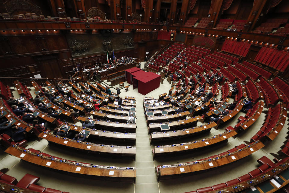 Votes are counted at the end of a voting session in the Italian parliament, in Rome, Monday, Jan. 24, 2022. The first round of voting for Italy's next president opens Monday without a clear slate of candidates. Political parties held internal meetings over the weekend, but were keeping the names of possible candidates close to their vests. (Yara Nardi, Pool photo via AP)