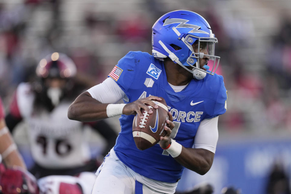 Air Force quarterback Haaziq Daniels rolls out for a pass against San Diego State in the first half of an NCAA college football game Saturday, Oct. 23, 2021, at Air Force Academy, Colo. (AP Photo/David Zalubowski)