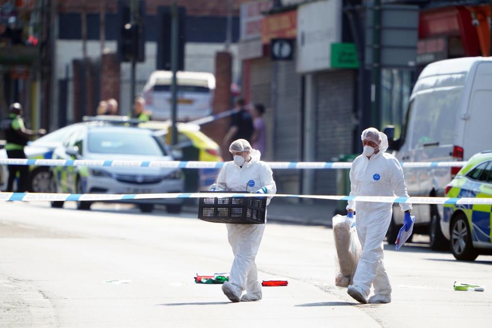 Forensics seen on scene in Nottingham city centre (PA)