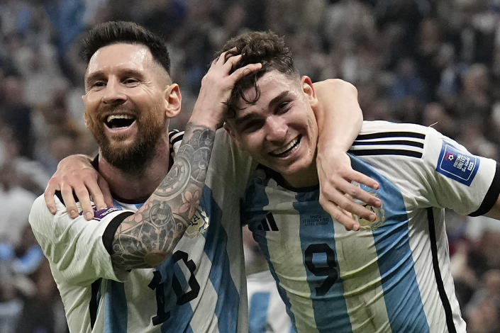 Argentina&#39;s Lionel Messi, left, and Argentina&#39;s Julian Alvarez celebrate after scoring during the World Cup semifinal soccer match between Argentina and Croatia at the Lusail Stadium in Lusail, Qatar, Tuesday, Dec. 13, 2022. (AP Photo/Martin Meissner)