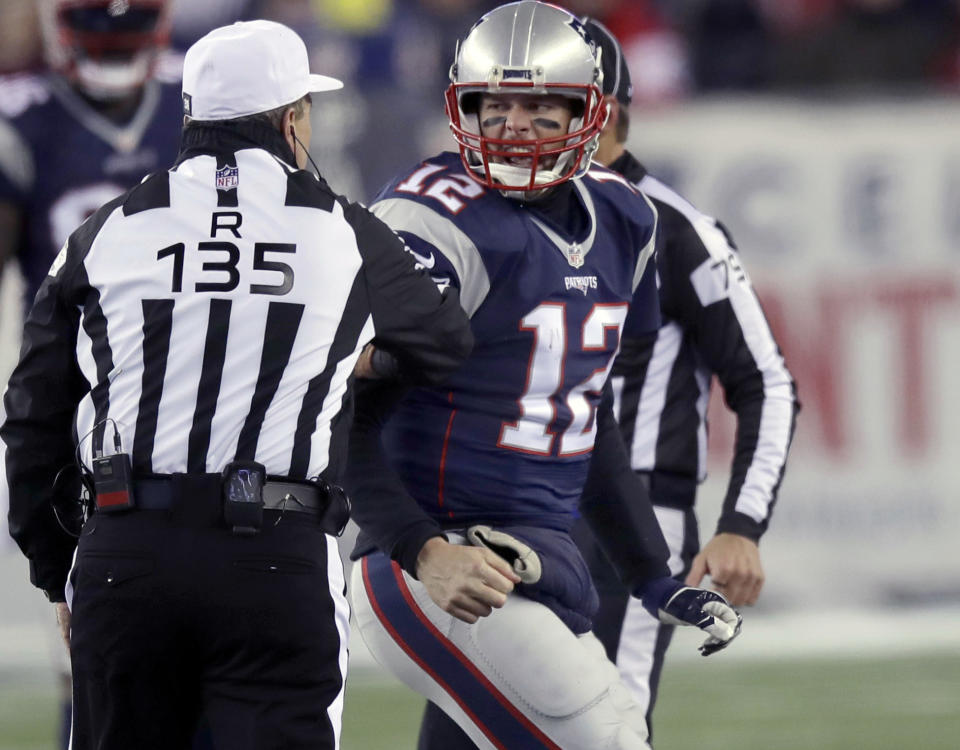 New England Patriots quarterback Tom Brady was not happy with a hit from Jadeveon Clowney. (AP)