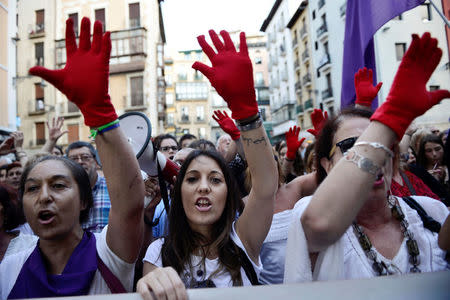 People protest the provisional release granted to five men cleared of the gang rape of a teenager and convicted of a lesser crime of sexual abuse in Pamplona, Spain, June 22, 2018. REUTERS/Vincent West