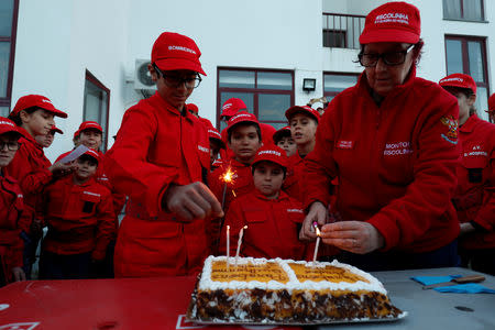 Members of firefighter school celebrate the birthday of two people after a training session in Oliveira do Hospital, Portugal November 10, 2018. Picture taken November 10, 2018. REUTERS/Rafael Marchante