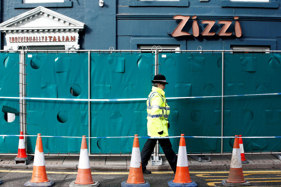 A police officer stands on duty outside a restaurant which has been secured as part of the investigation into the poisoning of former Russian inteligence agent Sergei Skripal and his daughter Yulia, in Salisbury, March 11, 2018. REUTERS/Henry Nicholls TPX IMAGES OF THE DAY