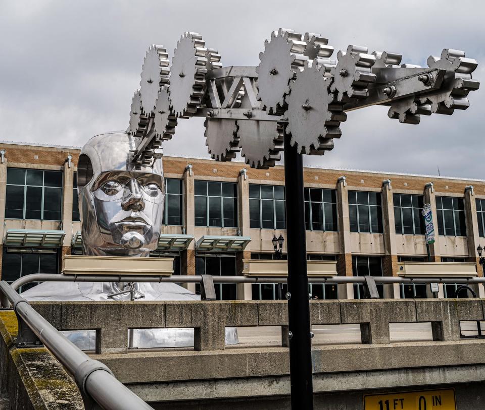 The interactive sculpture on Michigan Avenue across from the Lansing Center is called "Portrait of a Dreamer" by Ivan Iler. Photo: Thursday, April 21, 2022.