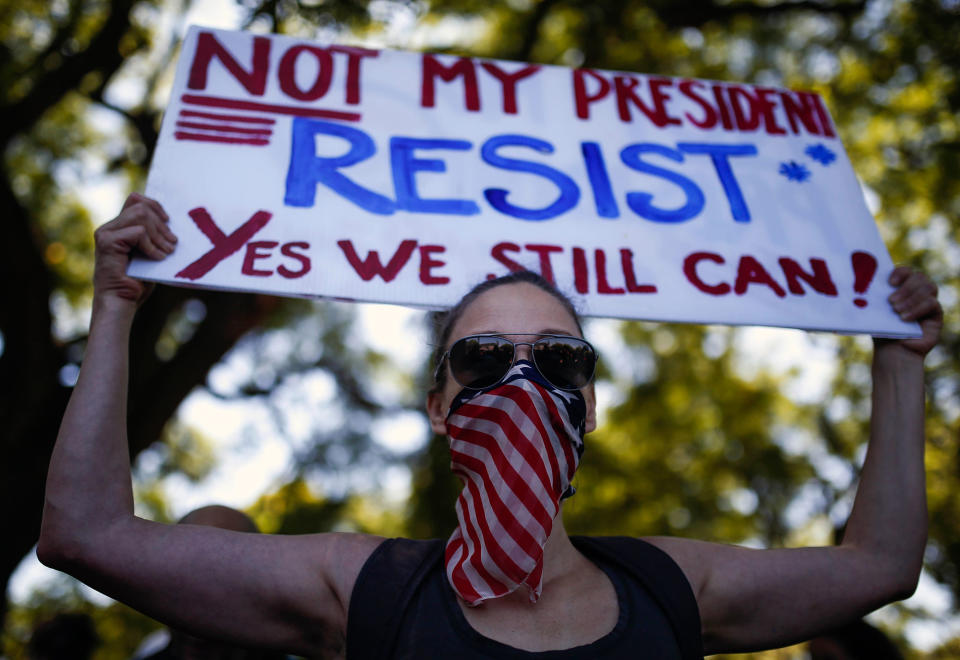 <p>A woman holds a sign during the women’s march rally in Buenos Aires, Argentina, Saturday, Jan. 21, 2017. The march was held in solidarity with the Women’s March on Washington, advocating women’s rights and opposing Donald Trump’s presidency. (AP Photo/Agustin Marcarian) </p>