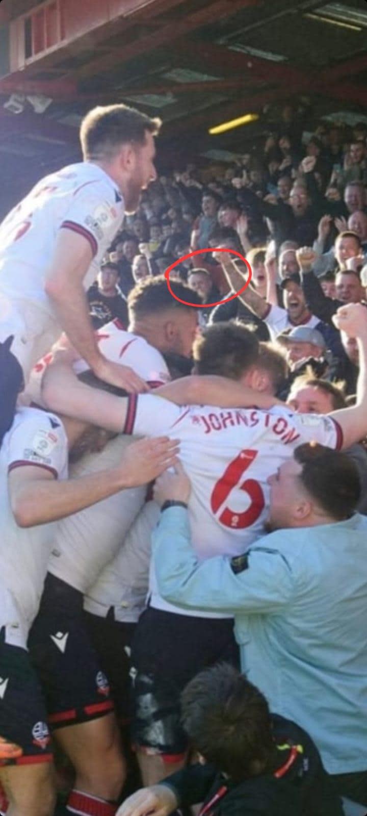 The Bolton News: A photograph that was on The Bolton News website shows Andy (circled) celebrating the goal moments before the pains set in