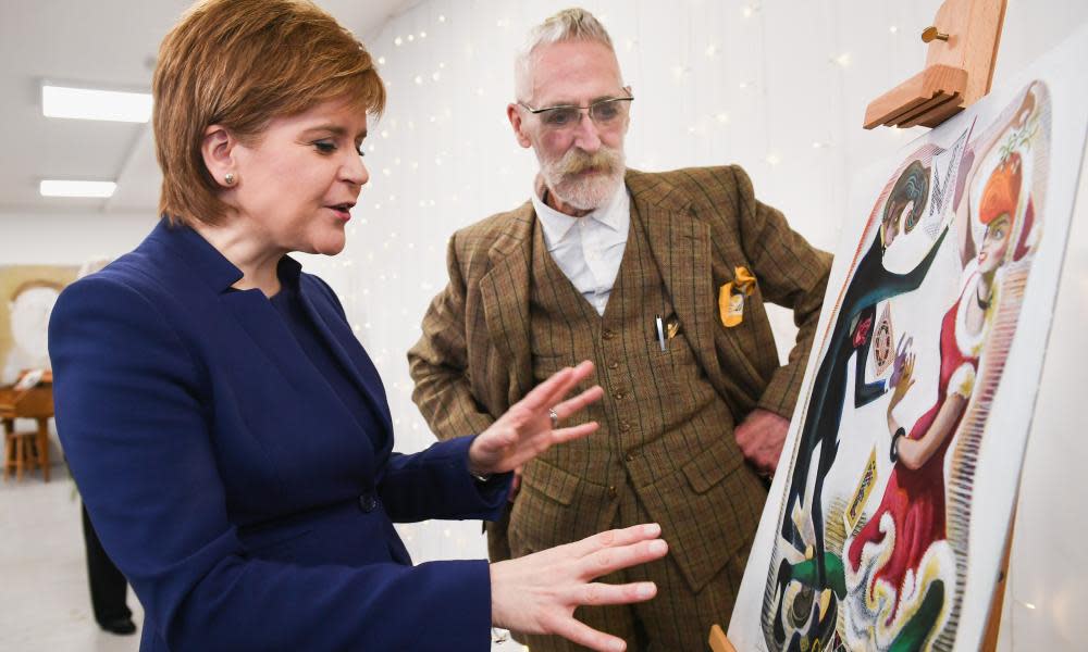 Scottish First Minister Nicola Sturgeon and John Byrne unveil the artwork for her official 2017 Christmas card at St Margaret’s House on 5 December in Edinburgh.