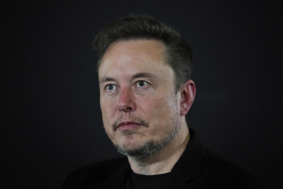 FILE - Elon Musk, CEO of Tesla and SpaceX, looks on during a conversation with British Prime Minister Rishi Sunak at Lancaster House in London, Thursday, Nov. 2, 2023. Former CNN reporter Don Lemon mixed it up in an interview with Musk Lemon posted on Musk's X social network Monday, March 18, 2024. (AP Photo/Kirsty Wigglesworth, Pool, File)