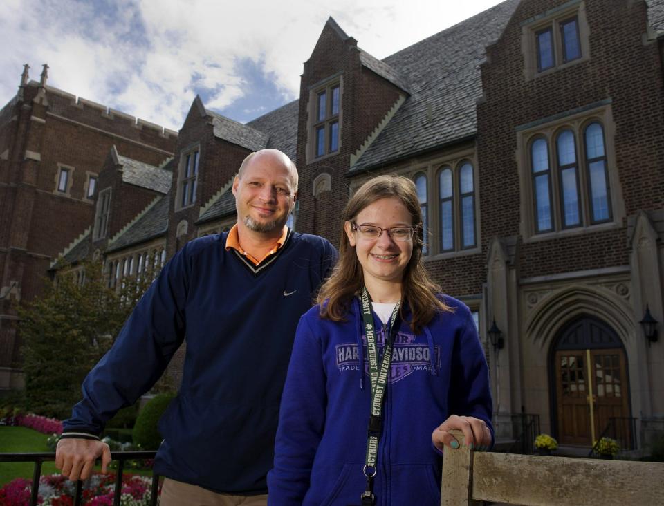 Brad McGarry poses with then-Mercyhurst University freshman Kaitlyn Stark in this 2015 file photo. Stark was a student in Autism Initiative at Mercyhurst, which McGarry coordinated. McGarry died Sunday after a two-year battle with amyotrophic lateral sclerosis.
