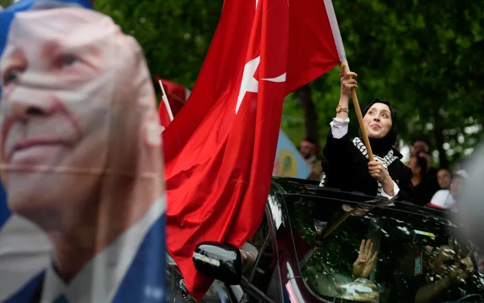 Supporters of Recep Tayyip Erdogan celebrating in istanbul - Khalil Hamra/AP