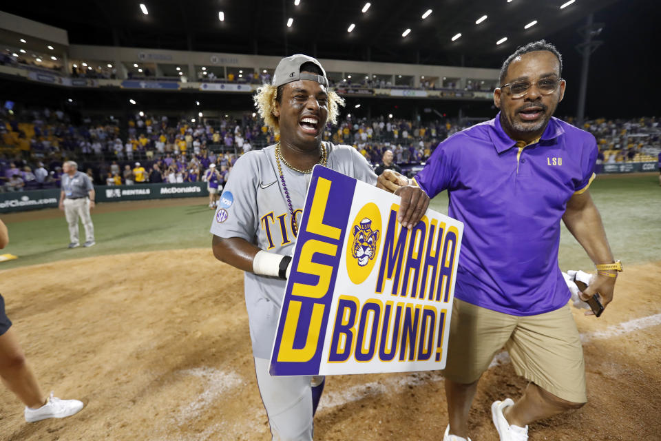 LSU first baseman Tre' Morgan celebrates after their team defeated Kentucky in an NCAA college baseball tournament super regional game in Baton Rouge, La., Sunday, June 11, 2023. LSU won 8-3. (AP Photo/Tyler Kaufman)