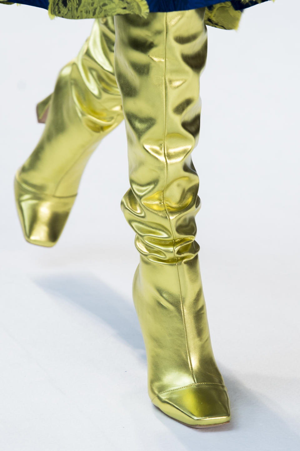 <p><i>Metallic knee boots from the SS18 Christian Siriano collection. (Photo: ImaxTree) </i></p>