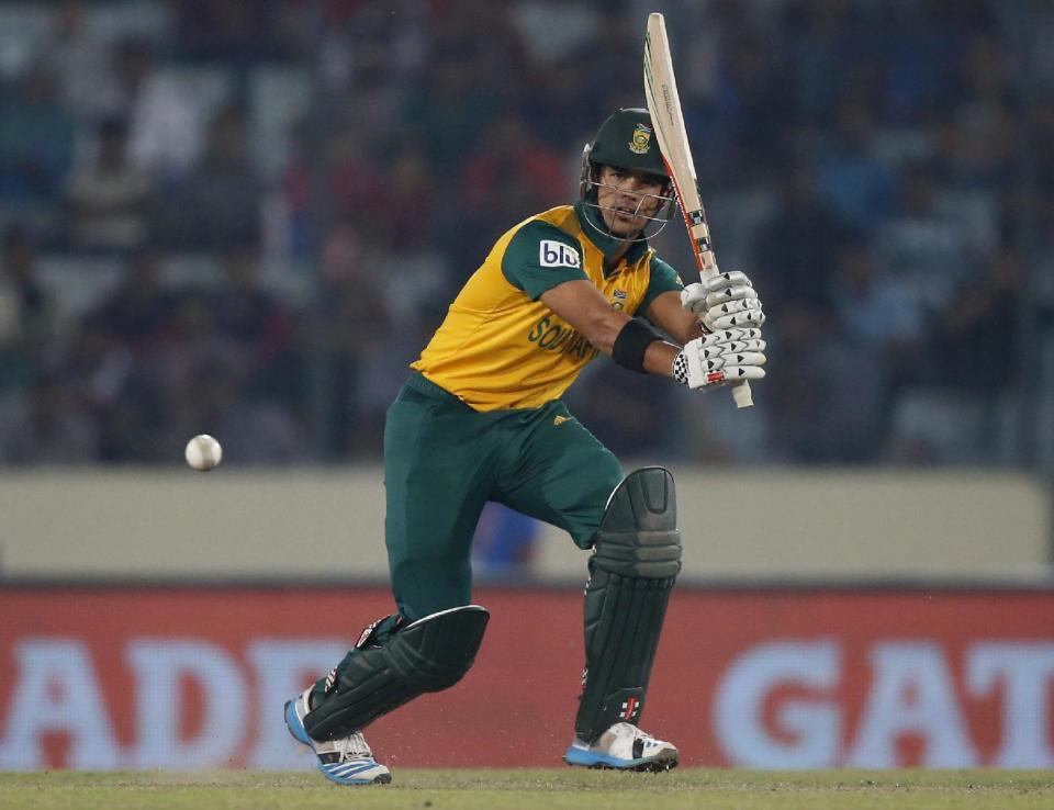 South Africa's batsman JP Duminy plays a shot during their ICC Twenty20 Cricket World Cup semi-final match against India in Dhaka, Bangladesh, Friday, April 4, 2014. (AP Photo/Aijaz Rahi)