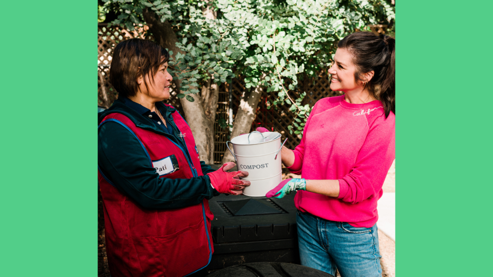 Tiffani with Lowe's Red Vest Associate and the Exaco Galvanized Steel Kitchen Compost Bin.