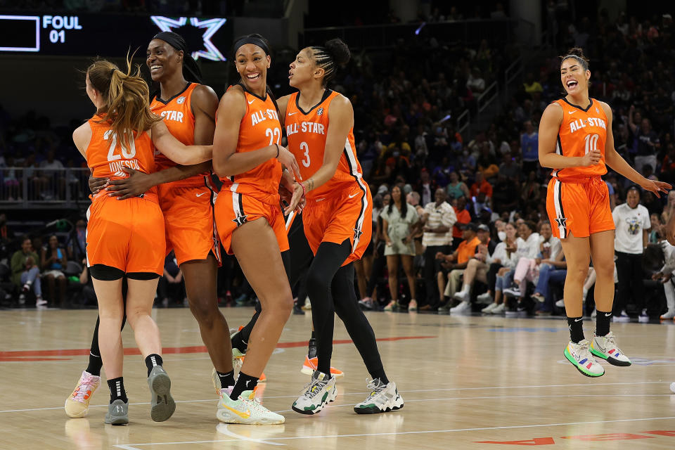 Team Wilson celebrates following a dunk by Sylvia Fowles against Team Stewart during the 2022 WNBA All-Star Game at the Wintrust Arena in Chicago on July 10, 2022. (Photo by Stacy Revere/Getty Images)