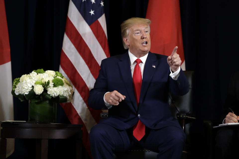 President Donald Trump talks while meeting with Japanese Prime Minister Shinzo Abe at the InterContinental Barclay New York hotel during the United Nations General Assembly, Wednesday, Sept. 25, 2019, in New York. (AP Photo/Evan Vucci)