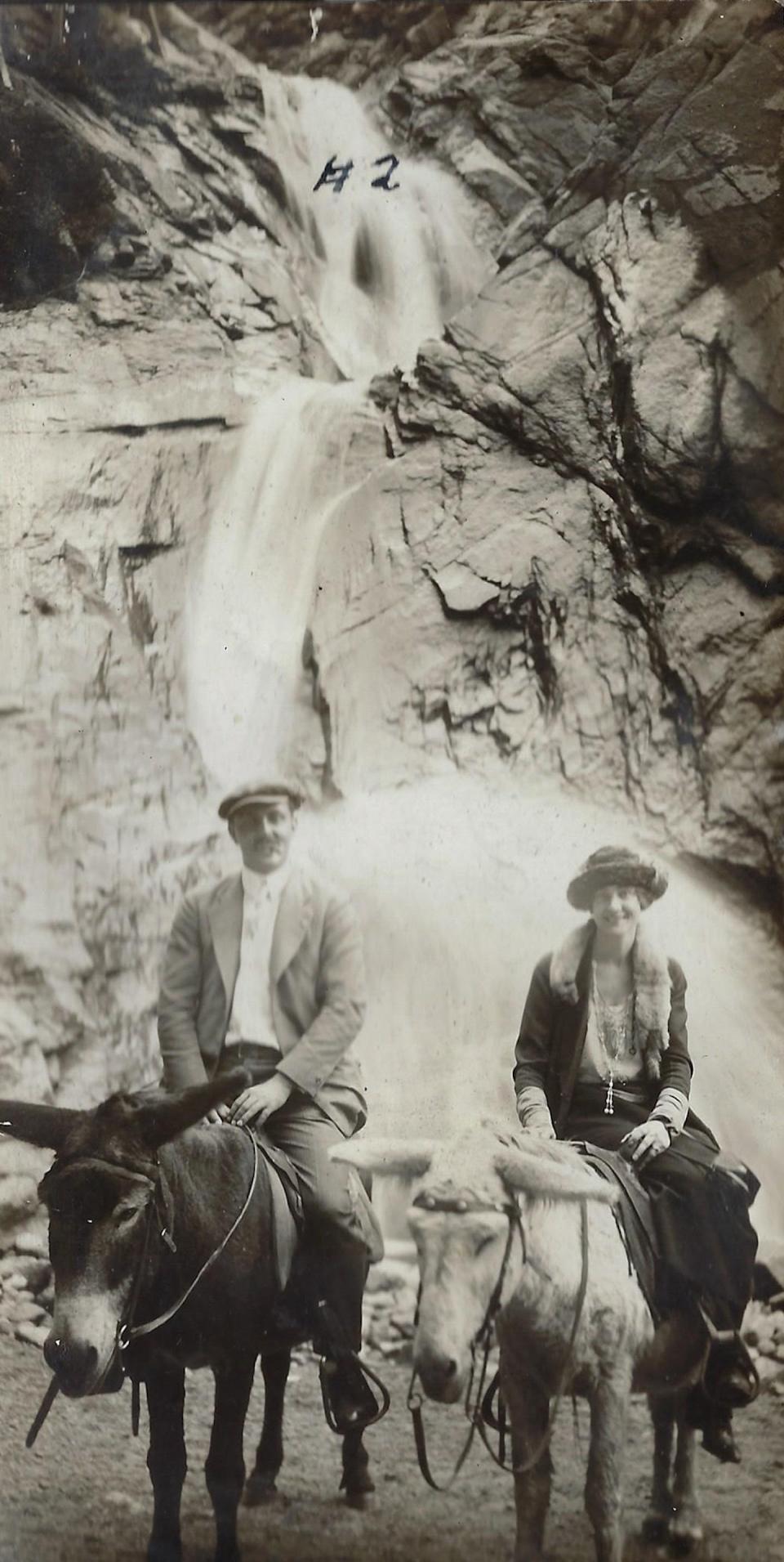 In this Sept. 26, 1921, photograph, Mary ‘Teddie’ Kemp and her husband, Gene, are riding on donkeys at Seven Falls and South Cheyenne Cañon, Colo. Jeffrey Littlejohn