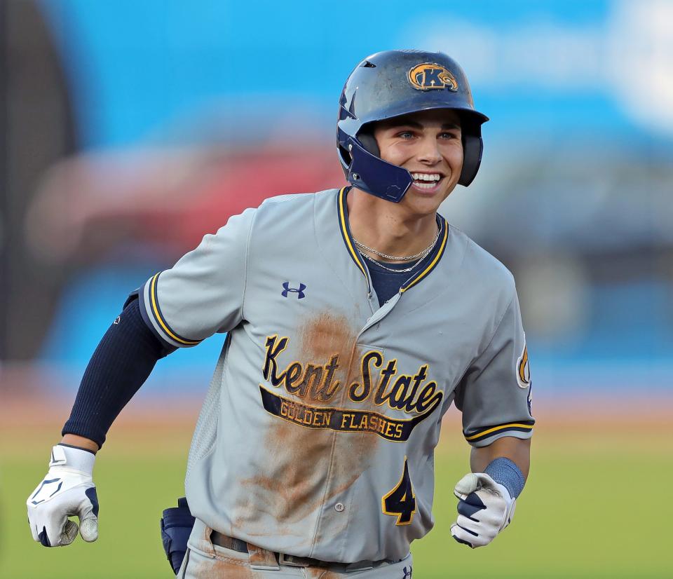 Kent State third baseman Kyle Jackson (4) rounds the bases after hitting a three-run homer to right field against the Akron Zips during the third inning of an NCAA baseball game at Canal Park, Tuesday, May 9, 2023, in Akron, Ohio.