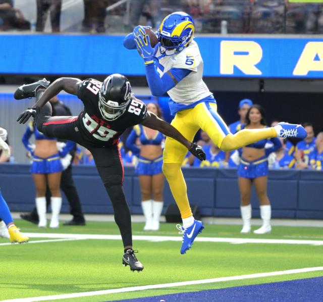 Los Angeles Rams defensive back Jalen Ramsey celebrates his interception in  the end zone in front