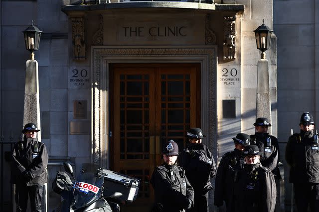 <p>HENRY NICHOLLS/AFP via Getty Images</p> Police outside the London hospital where Kate Middleton is recovering on Jan. 18, 2024