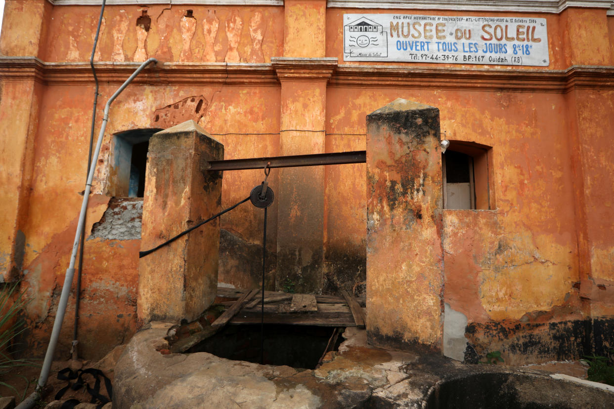 A pulley hangs over a well at the Old English fort which once housed a now defunct slavery museum in the historic slave port of Ouidah, Benin. (Photo: Afolabi Sotunde/Reuters)