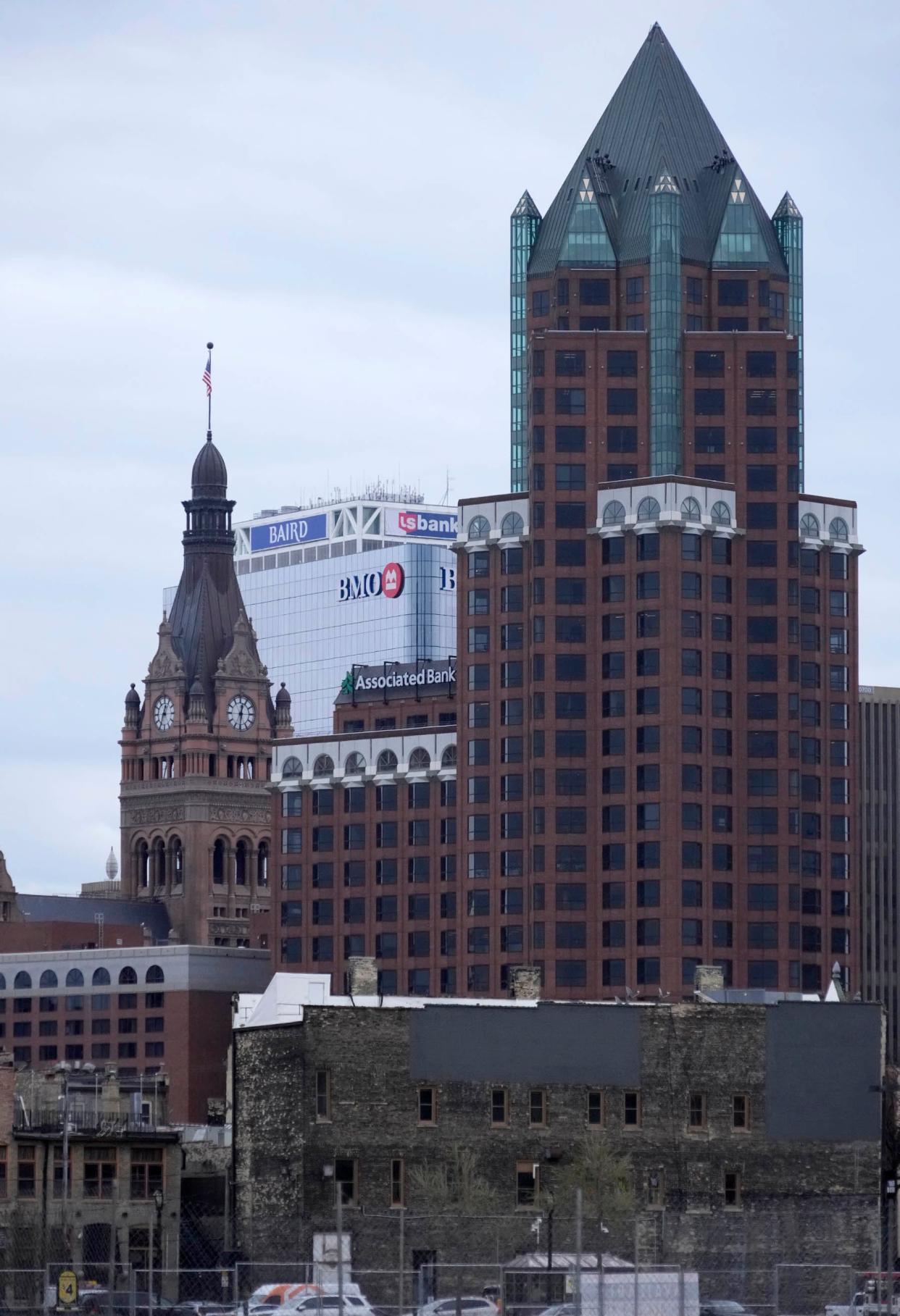 The Associated Bank River Center, Corporate Office (right) photographed in Milwaukee on April 18, 2024. Milwaukee City Hall, BMO Harris Bank and US Bank Building are in the background.