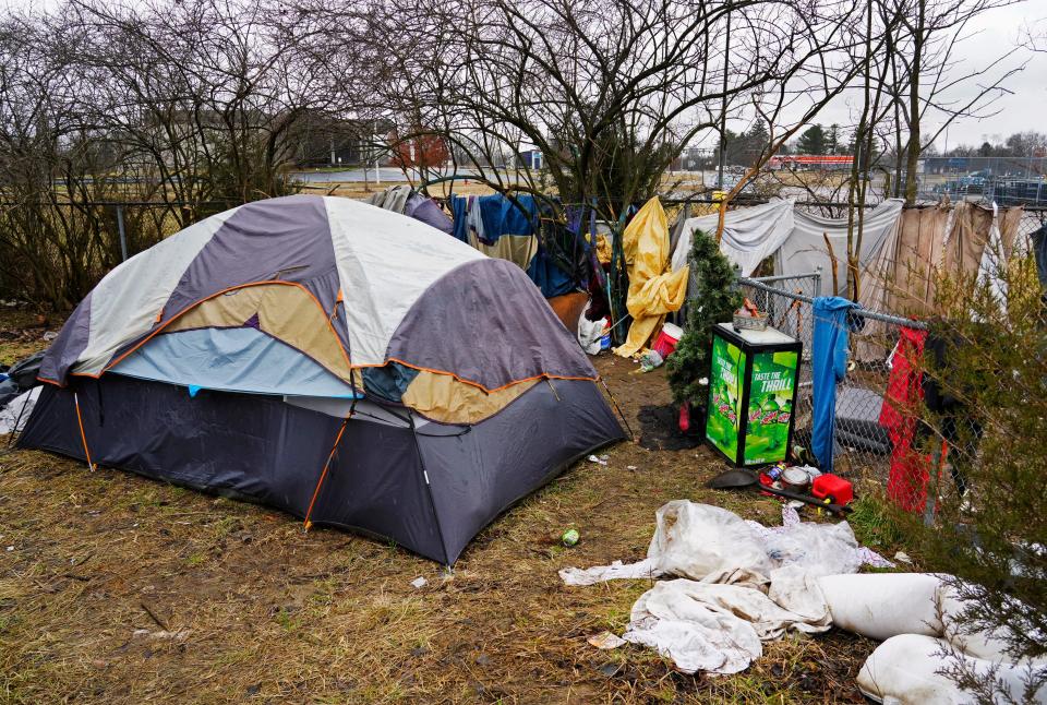 A homeless camp is set up behind the Tractor Supply Co. in Middletown. Middletown has created a u0022homeless crisis teamu0022 to sweep the city, connect homeless people to resources and make arrests for charges like trespassing and obstructing official business.