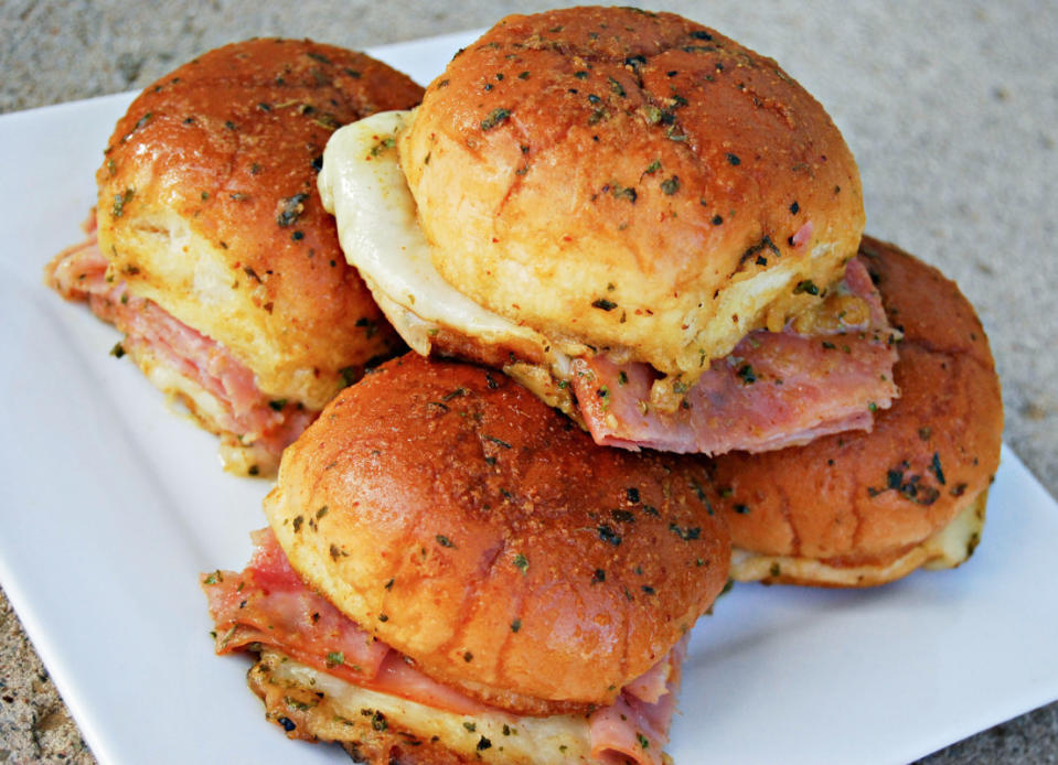 <p>Krista Marshall</p><p>Who doesn't love a hot ham and cheese sandwich? And with these, you get an extra kick for your taste buds!</p><p><strong>Get the recipe: </strong><strong><a href="https://parade.com/842688/kristamarshall/kickin-ham-cheese-sliders/" rel="nofollow noopener" target="_blank" data-ylk="slk:Kickin' Ham & Cheese Sliders;elm:context_link;itc:0;sec:content-canvas" class="link ">Kickin' Ham & Cheese Sliders</a></strong></p>