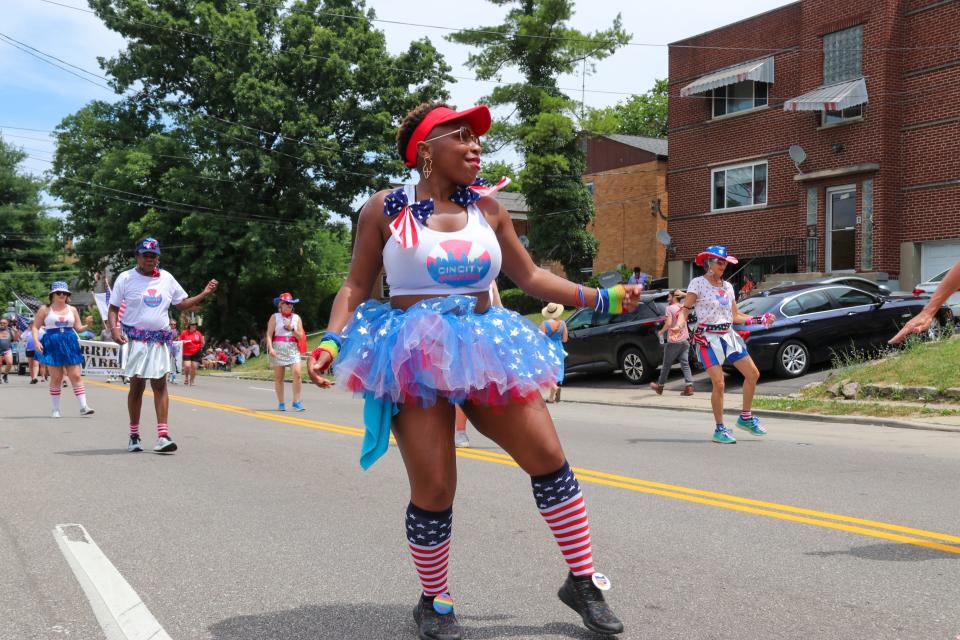 The Cincity Shakers dance down the road at the July 4th Northside Parade in 2022. This year's parade takes place Tuesday, July 4, 2023.