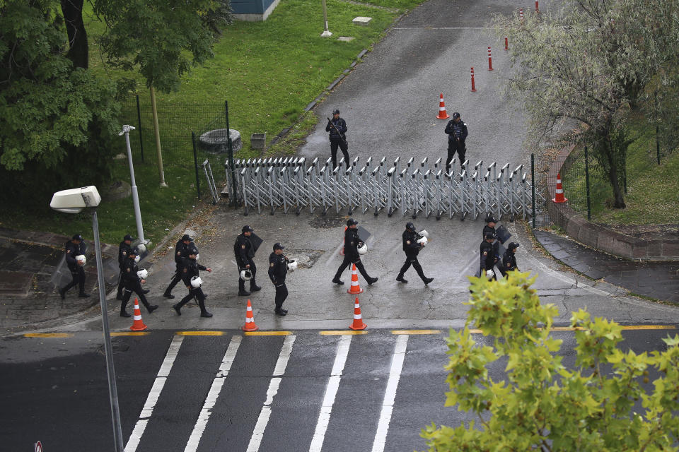 Turkish security forces cordon off an area after an explosion in Ankara, Sunday, Oct. 1, 2023. A suicide bomber detonated an explosive device in the heart of the Turkish capital, Ankara, on Sunday, hours before parliament was scheduled to reopen after a summer recess. A second assailant was killed in a shootout with police. (AP Photo/Ali Unal)