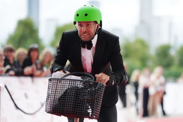 The face of a man desperate not to fall off a scooter in front of the entire nation's press (Photo: Scott Garfitt/Shutterstock)