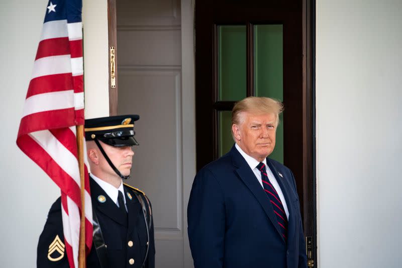 U.S. President Donald Trump welcomes Bahrain's Foreign Minister Abdullatif bin Rashid Al Zayani at the White House