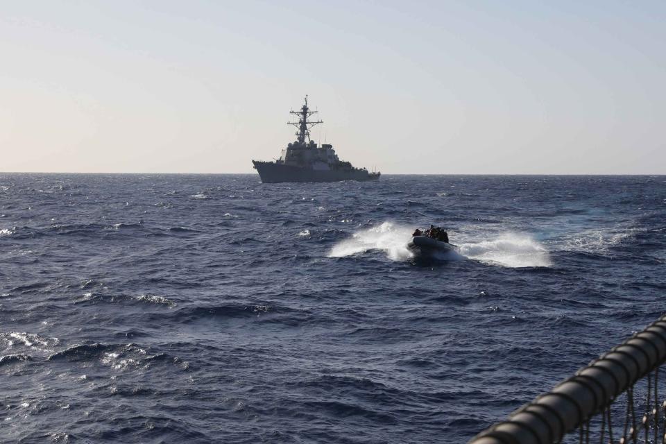 Sailors assigned to the Arleigh Burke-class guided-missile destroyer USS Carney (DDG 64) conduct small boat operations with the Arleigh Burke-class guided-missile destroyer USS Thomas Hudner (DDG 116), Nov. 27.