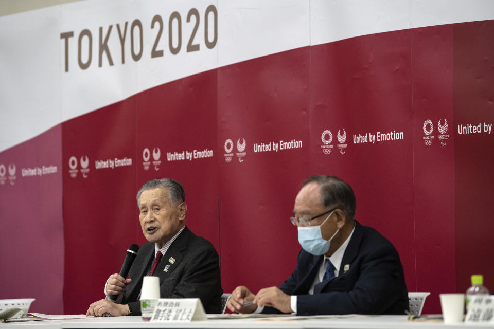 Yoshiro Mori, the president of the Tokyo 2020 Organizing Committee, speaks during the opening remarks session of the Tokyo2020 Olympics Executive Board Meeting, Tuesday, Dec. 22, 2020 in Tokyo, Japan. Honorary President Fujio Mitarai is at right. (Carl Court/Pool Photo via AP)