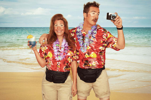 A sunburnt couple of tourists at the beach