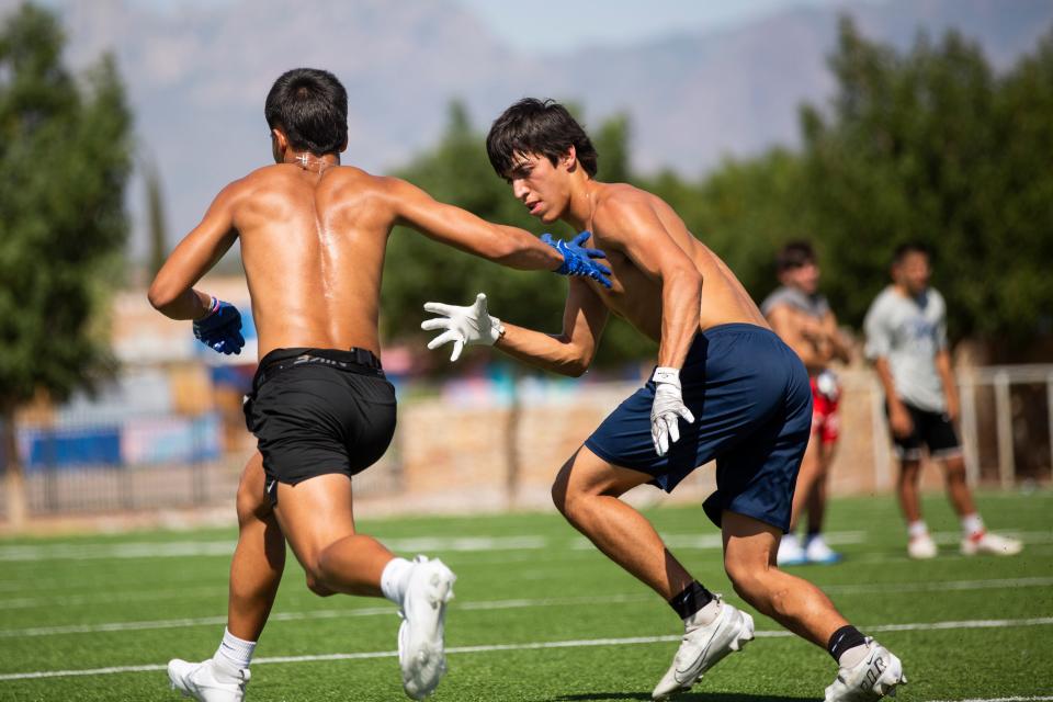 LCHS varsity defensive back Coen Morales runs through different plays during a practice on Thursday, July 28, 2023, at Las Cruces High School.