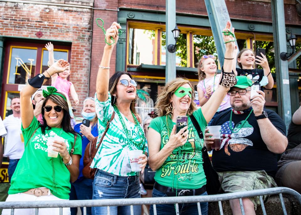 Melissa Eaton, Leigh Hite and Jennifer Broyles were hundreds of parade spectators on Beale Street for the 47th Annual Silky Sullivan St. Patrick's Parade on May 1, 2021. (The parade was held in May that year due to the COVID-19 pandemic.)