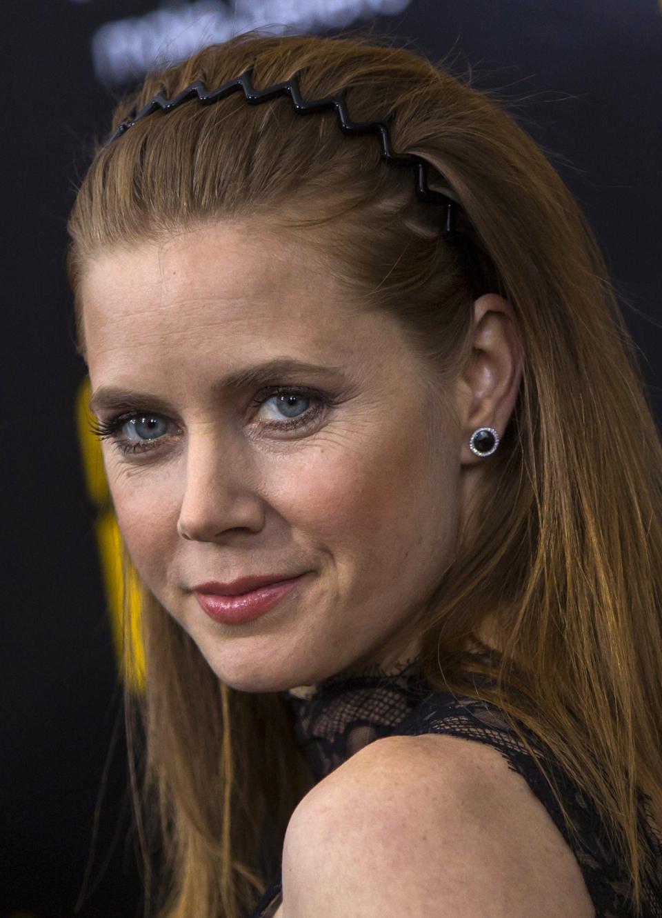 File photo of actress Amy Adams attending the premiere for the film "American Hustle" in New York