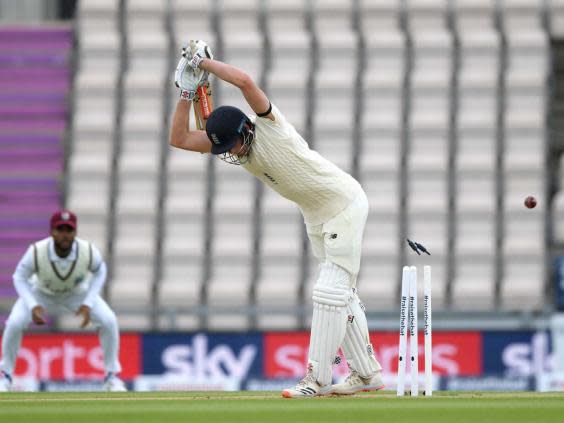 Dom Sibley is bowled by Shannon Gabriel on day one (Getty)