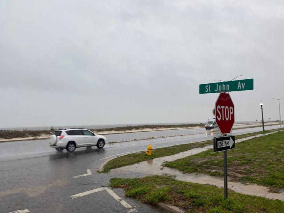 Heavy rain covers a portion of U.S. 90 in Biloxi on Wednesday.