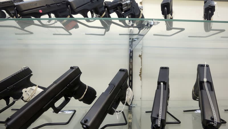 This June 29, 2016, file photo shows guns on display at a gun store in Miami. Gun sales have surged among Jews throughout the United States since Hamas attacked Israel more than two weeks ago, according to news reports.