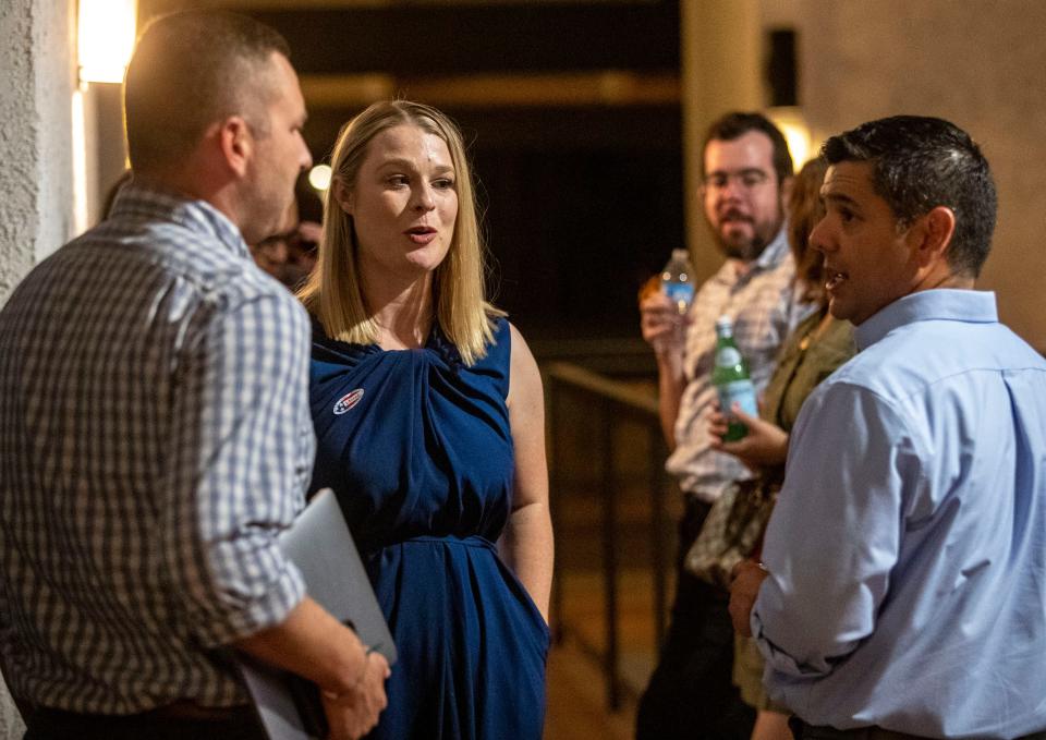 Palm Springs city councilmember Christy Holstege talks with U.S. Rep. Raul Ruiz at her campaign office in Palm Desert, Calif., Tuesday, June 7, 2022.