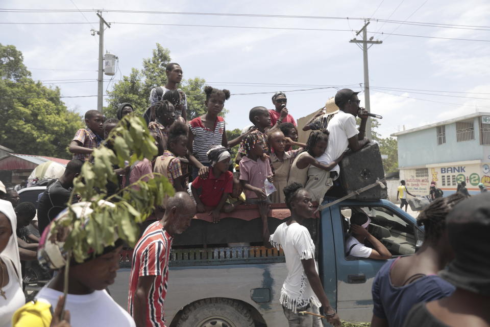 Students from the El Roi academy join a demonstration to demand the freedom of New Hampshire nurse Alix Dorsainvil and her daughter, who have been reported kidnapped, in the Cite Soleil neighborhood of Port-au-Prince, Haiti, Monday, July 31, 2023. Dorsainvil works for the El Roi Haiti nonprofit organization and the U.S. State Department issued a "do not travel advisory" ordering nonemergency personnel to leave the Caribbean nation amid growing security concerns. (AP Photo/Odelyn Joseph)