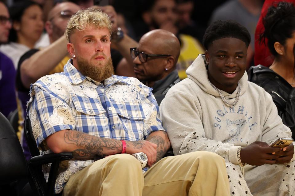 Mar 8, 2024; Los Angeles, California, USA; Jake Paul and Kill Jasper attend the game between the Los Angeles Lakers and the Milwaukee Bucks at Crypto.com Arena. Mandatory Credit: Kiyoshi Mio-USA TODAY Sports